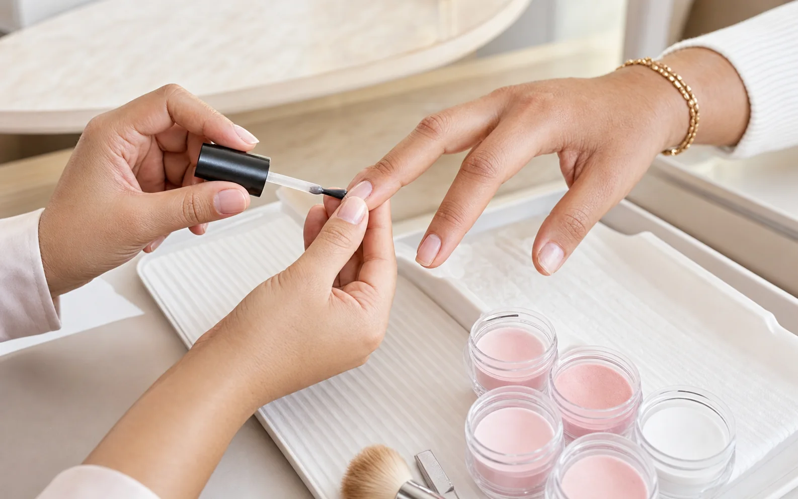 Dip Powder Nails preparation and process at a College Station nail salon